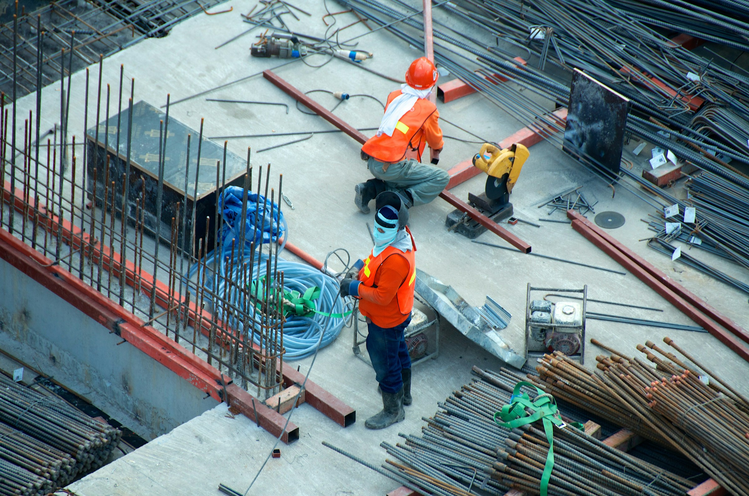 Construction workers on active building site